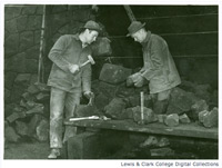 Unidentified members of Civilian Public Service Camp #21 construct a rock wall at the Cascade Locks Ranger Station.