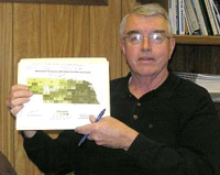 Vic Gentry, manager of the 2010 Census office in North Platte, displays a map showing the percentage of households that responded to the 2000 Census.