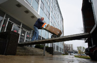 Bob Waalkes, of Lakeshore Office Furniture, Muskegon, moves items from the Muskegon County clerk's office out of the Michael E. Kobza Hall of Justice, 990 Terrace, in Muskegon Thursday. The office is moving to 141 E. Apple for 18 months to two years, while the first and second floors of the Michael E. Kobza Hall of Justice are being renovated. The office, which is closed for the move, will be open for business at the Apple location Monday.
