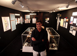 Hatteras Island native Scott Dawson stands in his Hatteras Histories and Mysteries Museum, which he opened in Buxton after the April dig. (L. Todd Spencer | The Virginian-Pilot)