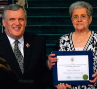 Glencoe Historical Society president JoAnn Galbraith, of Middlemiss, received the Lieutenant Governor s Ontario Heritage Award from David Onley during a ceremony in Toronto on Friday, Feb. 25.