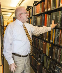 Michael Clegg, associate director at the Allen County Public Library, points out a few genealogical periodicals.