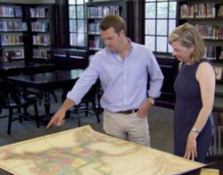 Chris O'Donnell looks at a map with Dr. Amy S. Greenberg at the Georgetown Neighborhood Library in Washington, DC., during an episode of TLC's "Who Do You Think You Are?" (TLC photo)