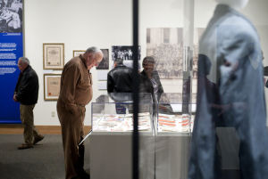 Visitors browse artifacts on display in the new exhibit at the Museum of the Confederacy in Appomattox, Va., March 6, 2014. (Photo by Parker Michels-Boyce/The News & Advance)