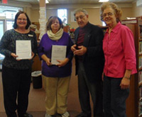 Photographed are library personnel, Barbara Beaton and Susan Wess, and the Rev. Vern Campbell, retired pastor of People’s Presbyterian Church, and Milan historian Martha Churchill. Campbell and Churchill collaborated on complying marriage and death records kept by Campbell as pastor for 31 years.