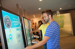 At the Seattle Discovery Center in Bellevue, Washington, Trace Farmer of Seattle, Washington, discovers 4,586 people share his first name while using the “Discover My Story” experience.