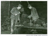 Unidentified members of Civilian Public Service Camp #21 construct a rock wall at the Cascade Locks Ranger Station. Unidentified members of Civilian Public Service Camp #21 construct a rock wall at the Cascade Locks Ranger Station.