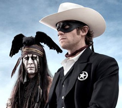 Johnny Depp, left, as Tonto joins forces in a fight for justice with Armie Hammer, as John Reid, a lawman who has become a masked avenger, The Lone Ranger, from the movie, 'The Lone Ranger,' opening July 3. (Photo: Peter Mountain, AP)